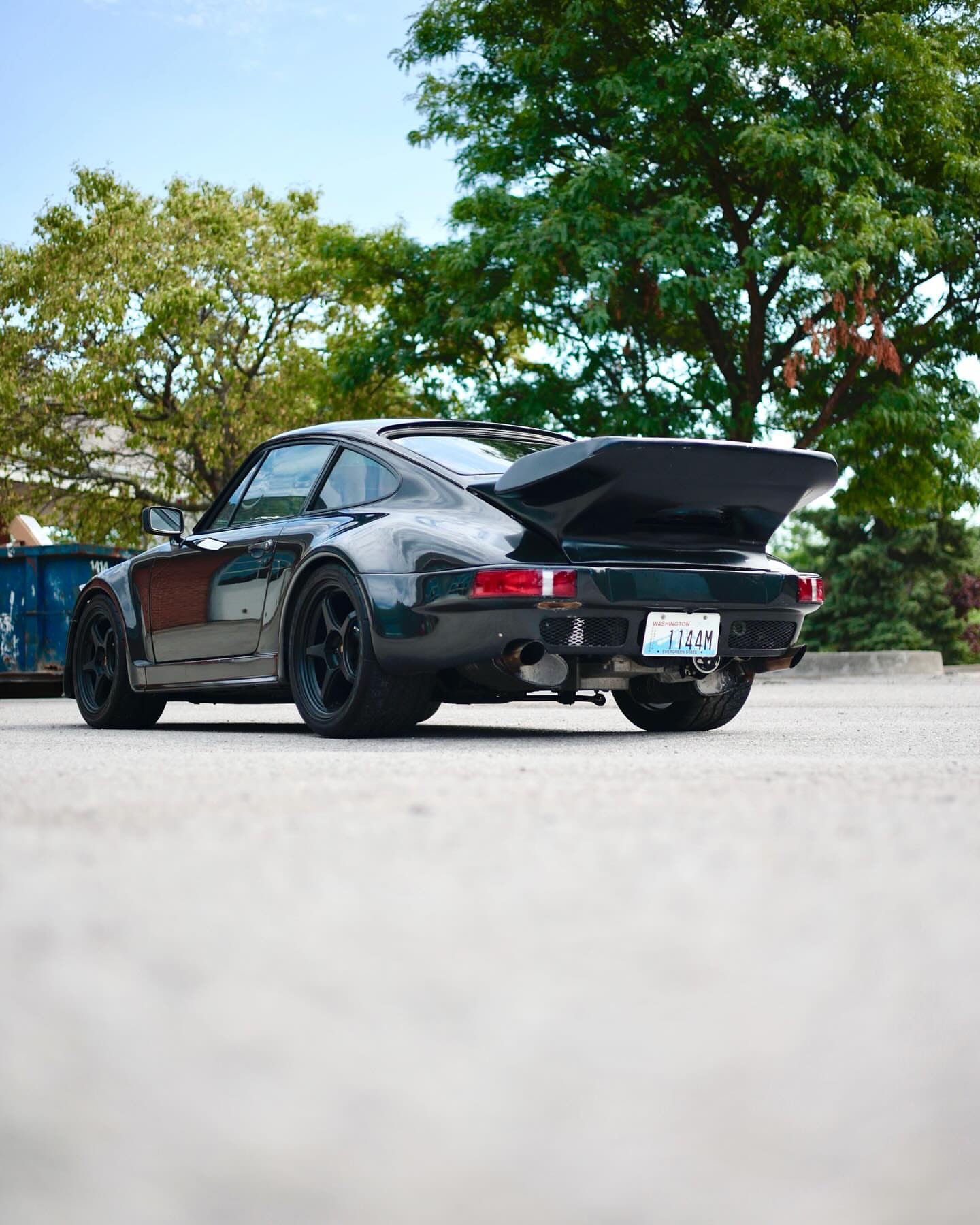 Rear view of a black classic Porsche 911 Turbo